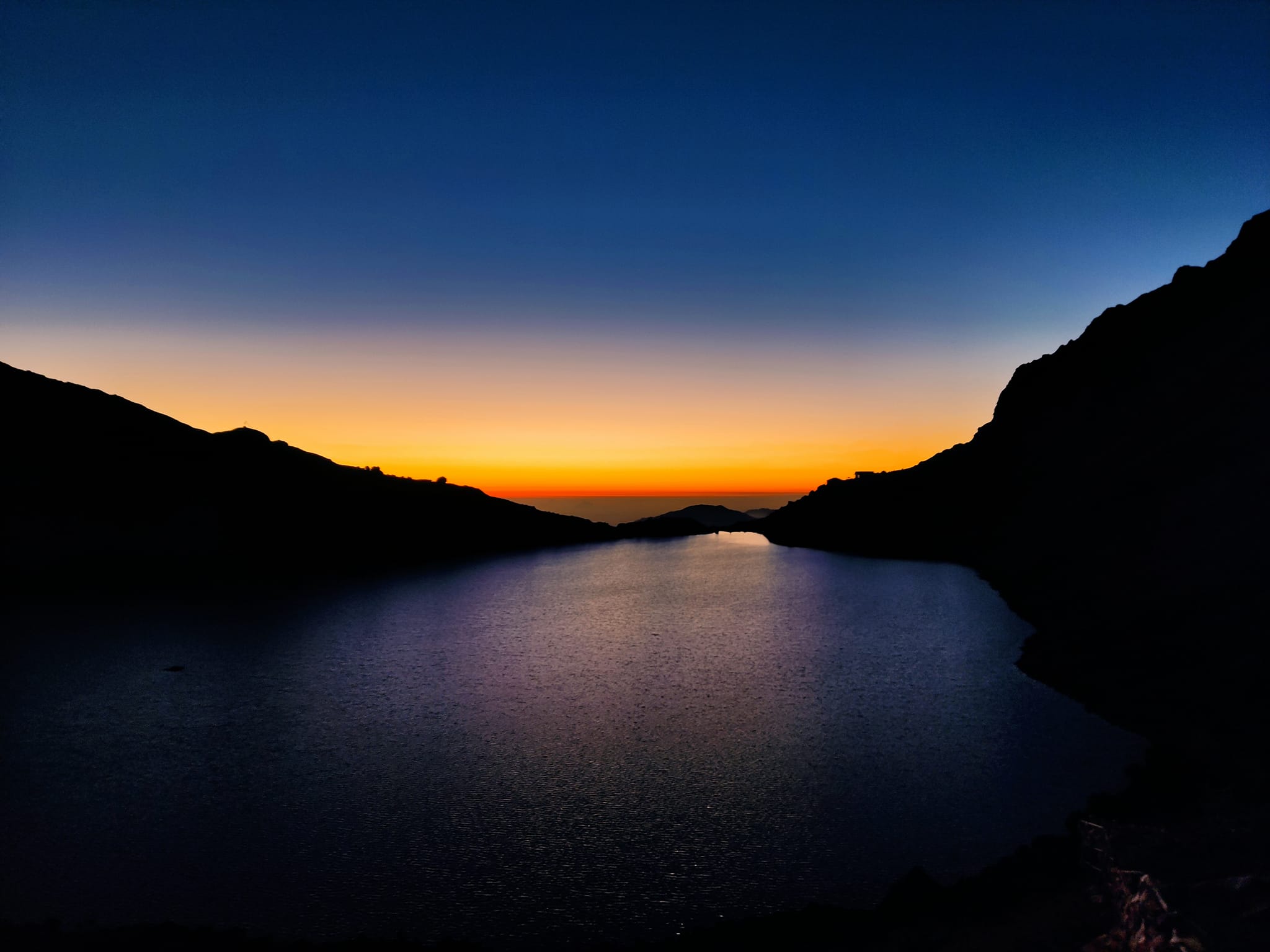 Dusk over an alpine lake, Nepal